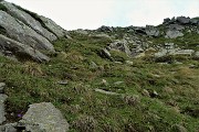 54 Ultimo ripido tratto di salita dal valloncello al Pizzo Scala